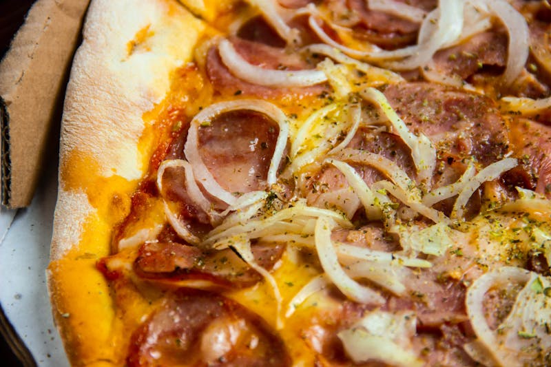 Smokehouse ranch pizza with pulled pork and caramelized onions