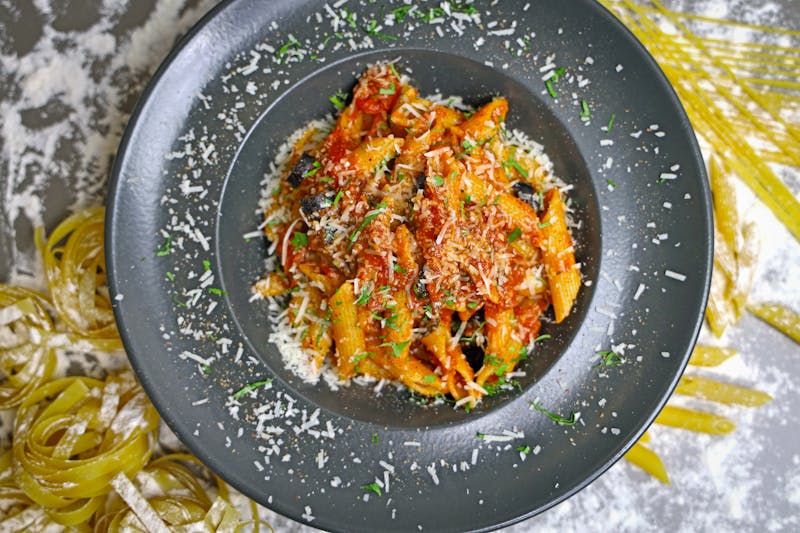 Penne arrabbiata spicy tomato pasta with herbs