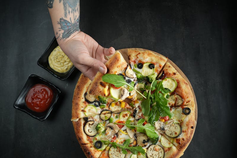 Signature ranch pizza with creamy ranch dressing base